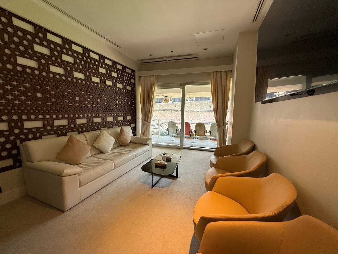 A hospitality lounge with majlis-style seating