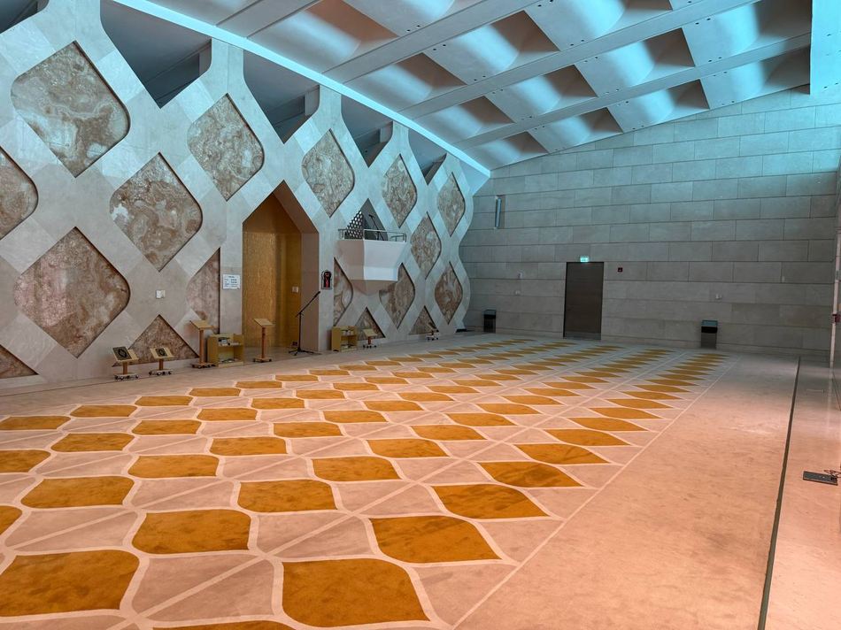 The prayer hall looking back toward the entrance doors
