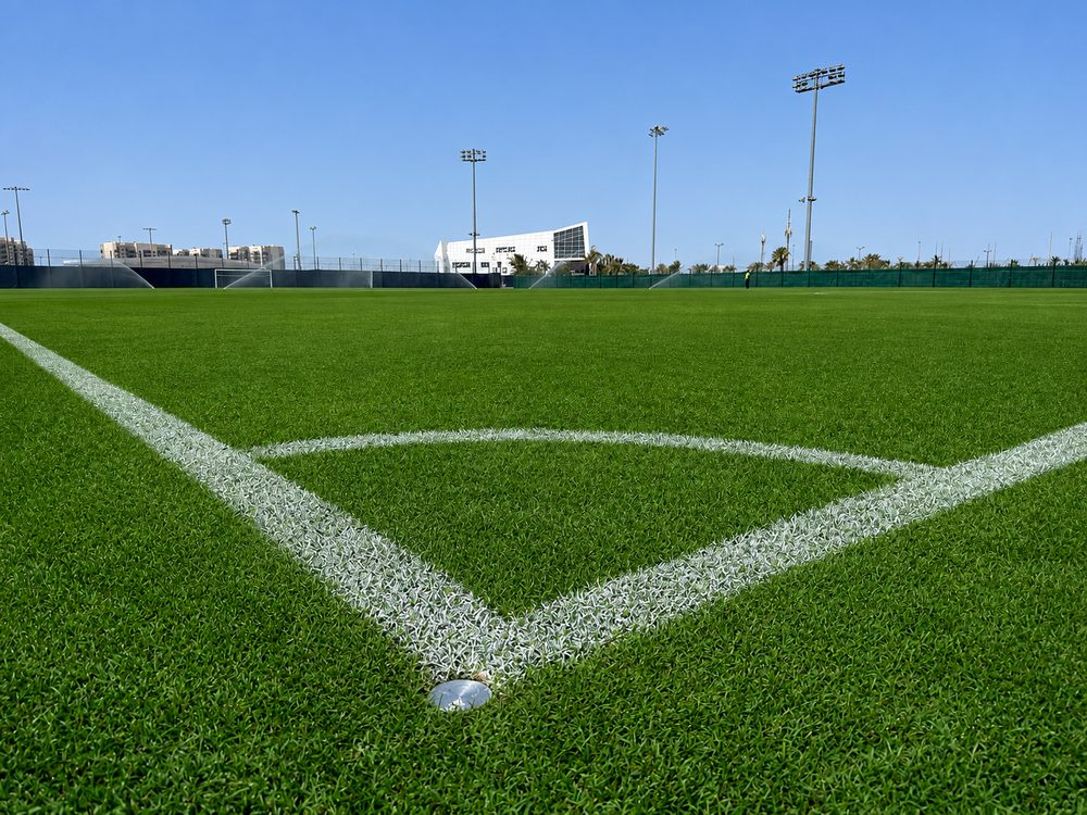 A corner arc and pitch markings seen from ground level