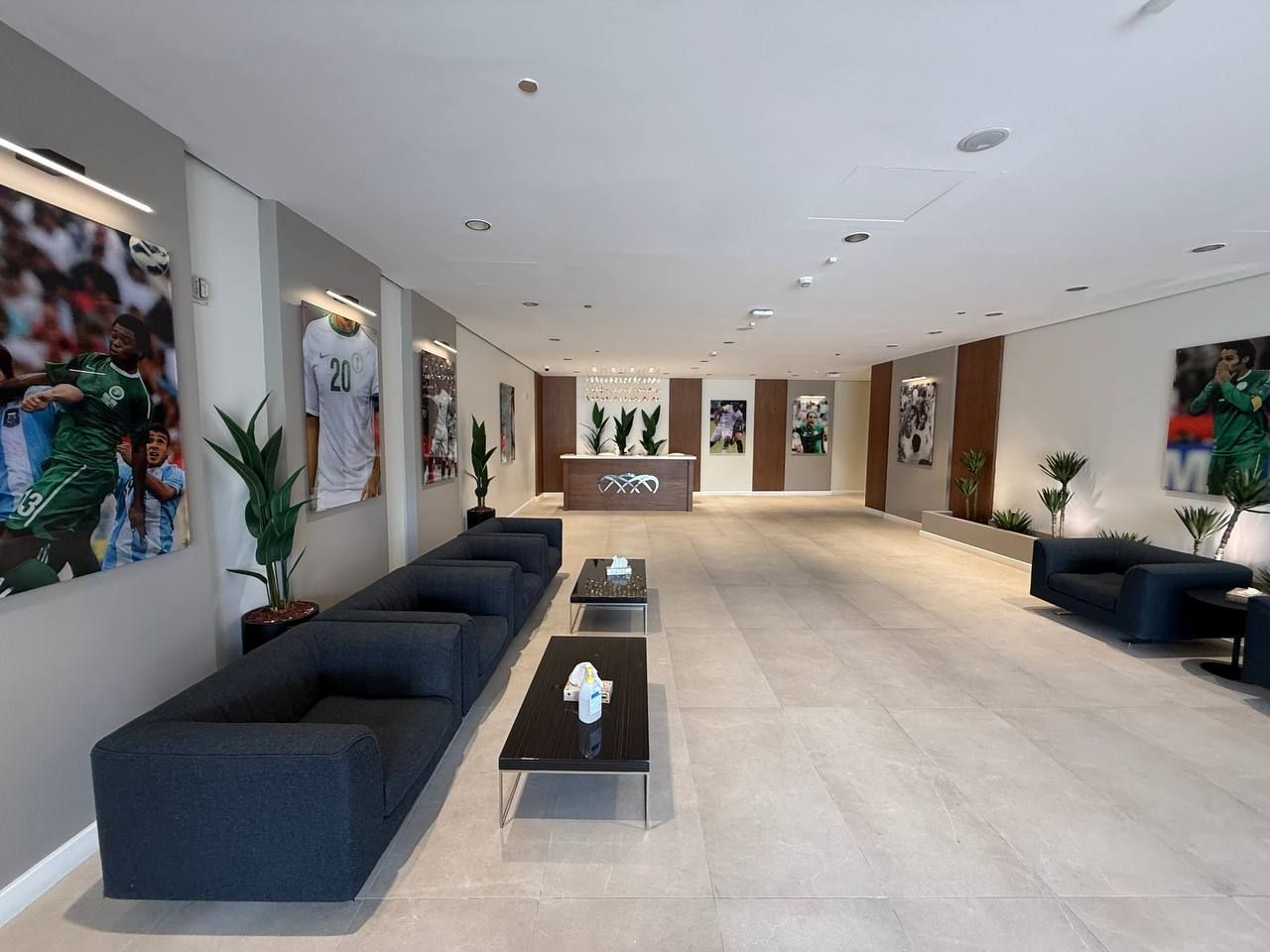 The VIP lounge lined with national team portraits