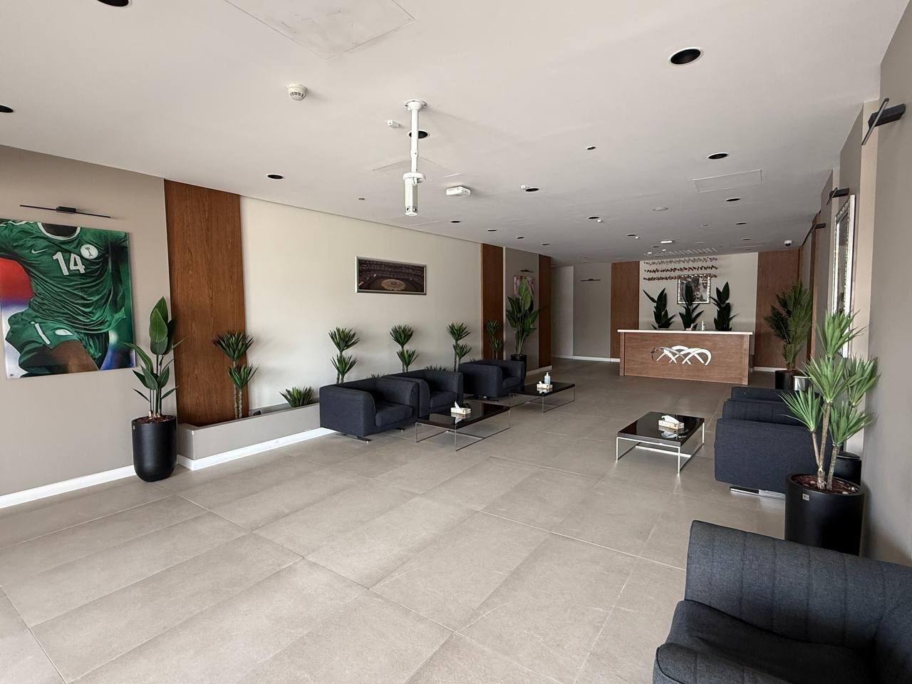 Rows of sofas and tables in the VIP lounge