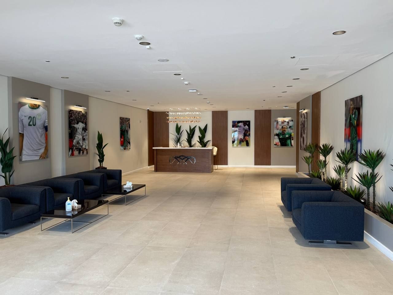 Seating along the planted wall of the VIP lounge