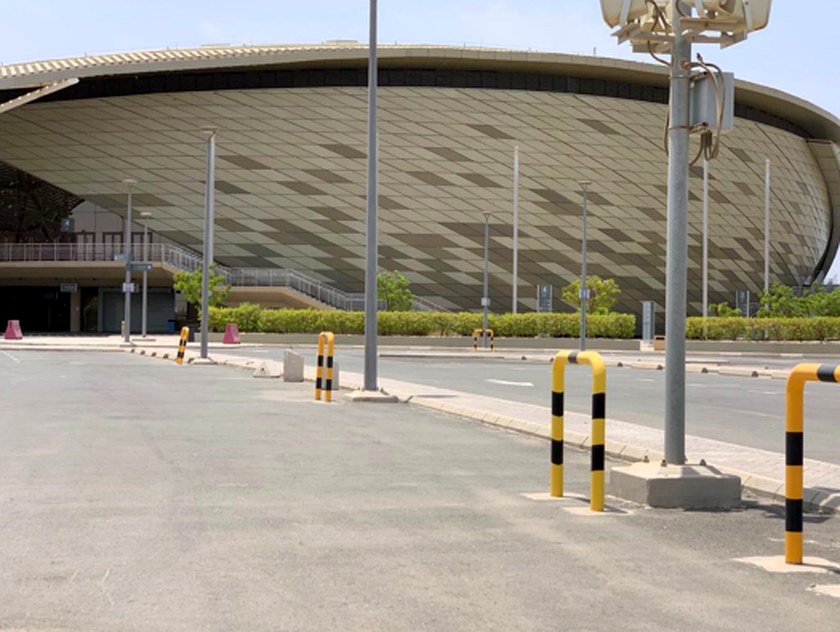 The exterior of the Sport Hall seen from the approach road and car park